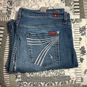 7FAMK jeans DOES HAVE A HOLE IN BUTT! I love them.